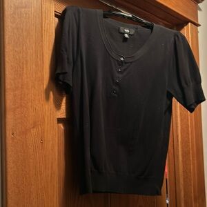 Short sleeve black sweater. Size xl although it fits like a Large.